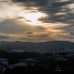 Imagem ilustrativa: Previsão do tempo para Contagem MG hoje sol com nuvens e céu nublado à noite
